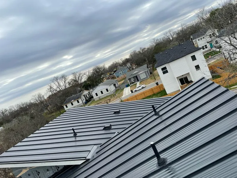 Standing seam metal roof panels with vents for Skylight Repair in Campton Hills